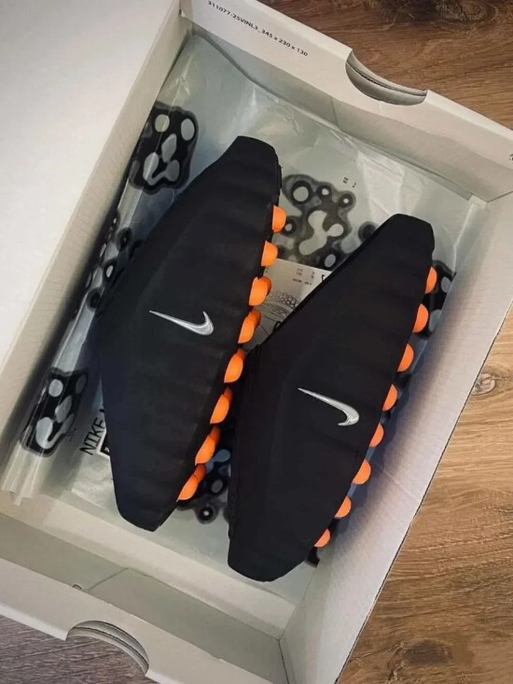 Nike Black Slides with Orange Cushion Pods